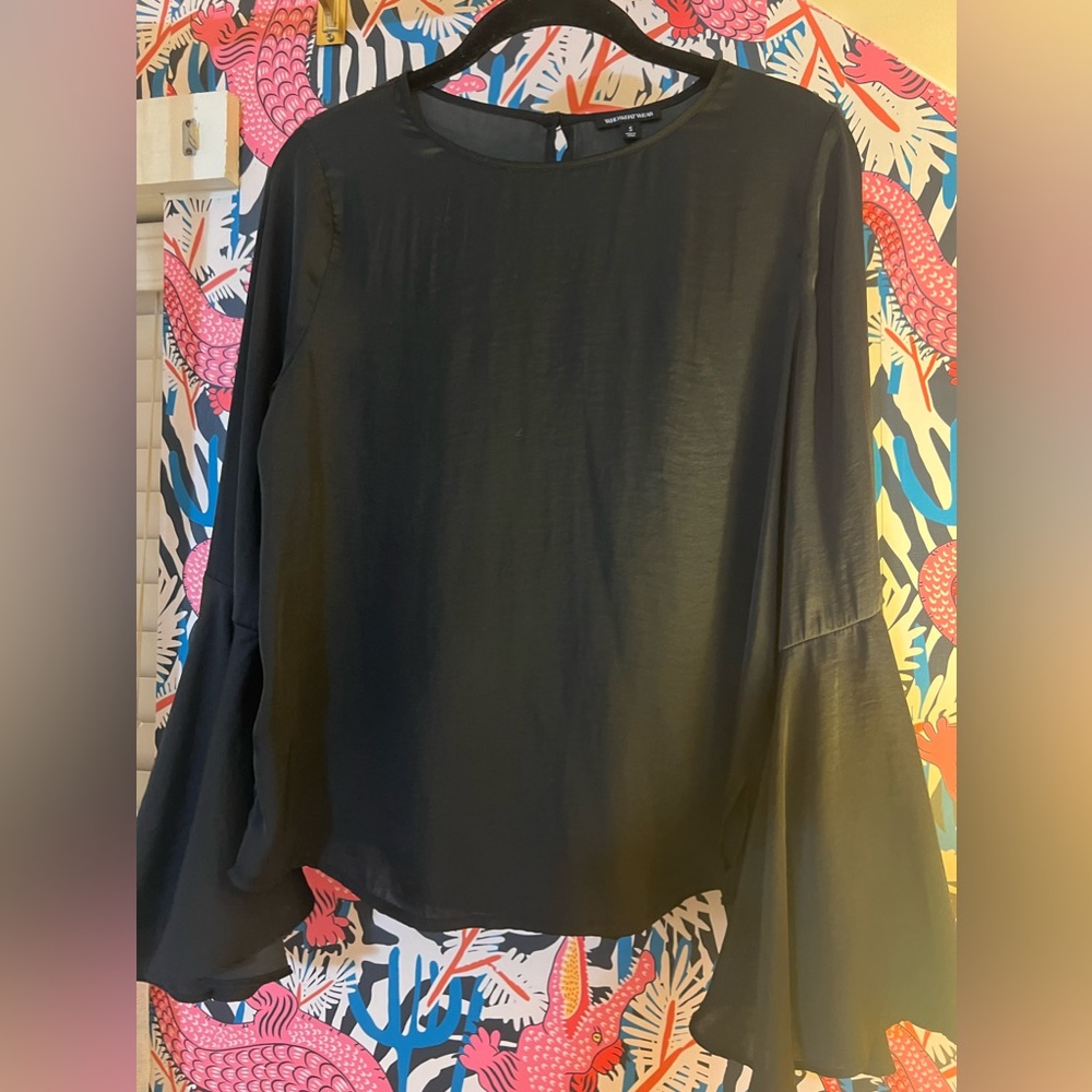 Blk satin blouse w huge bell sleeves, simple but dressy. So cute under a jacket